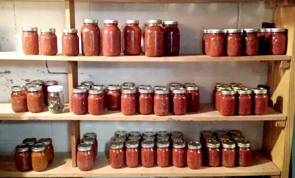 The top shelf is spaghetti sauce, chili base and bloody Mary mix; the second shelf is pizza sauce and salsa; and the bottom shelf is all salsa.